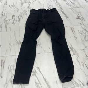 Woman’s Black Distressed Jeans